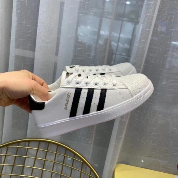 Made in China white flat board shoes for men and women couples sports shoes CXN
